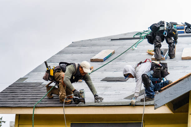 Professional Storm Damage Roof Repair technician working in East Taunton, MA